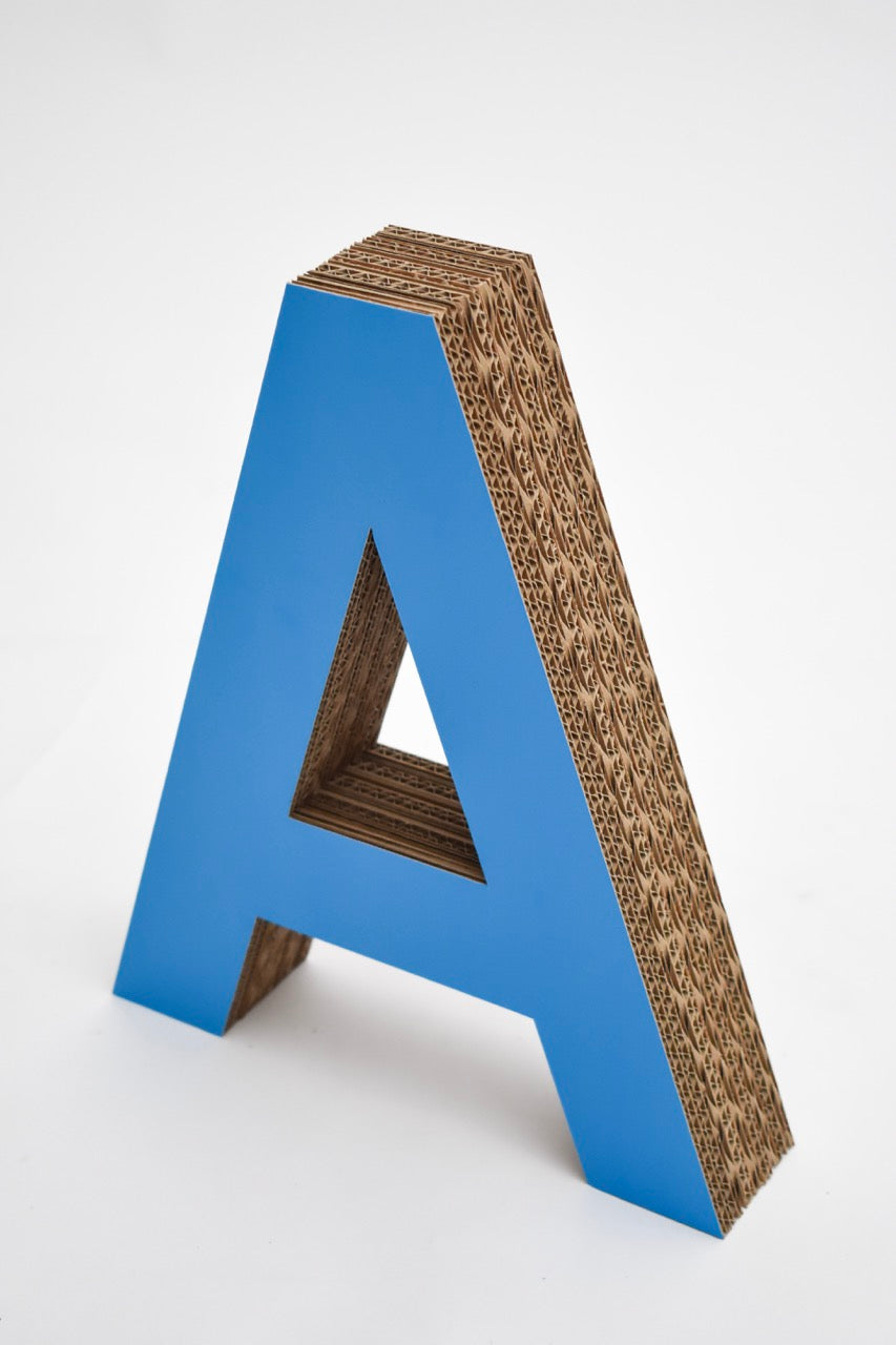 Cardboard layered letters and numbers
