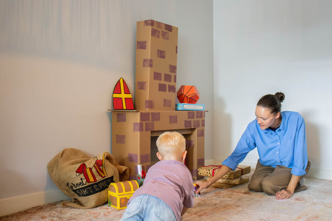 Sinterklaas schoorsteen van karton met kind en vrouw