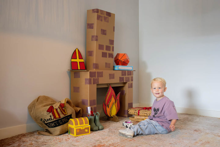 Sinterklaas schoorsteen van karton met kind