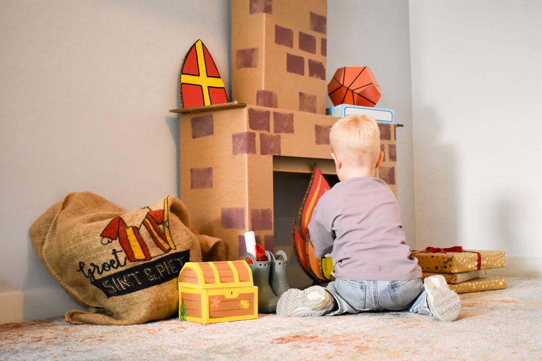 Sinterklaas schoorsteen van karton met kind