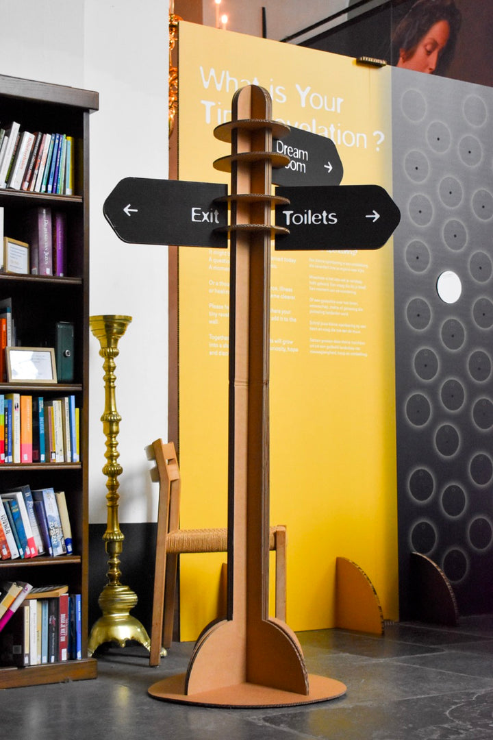 Large cardboard signpost